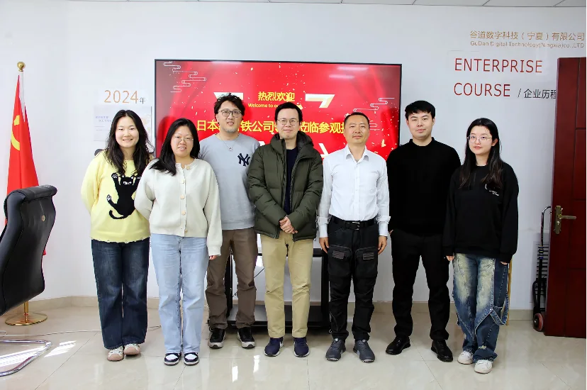 Group photo of Nippon Steel delegation and Panson management team