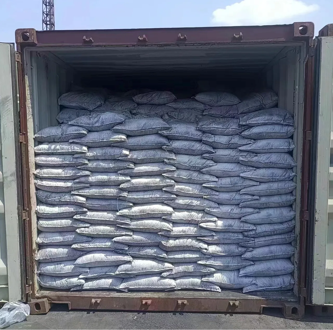 Containerized carbon additive loading for shipment